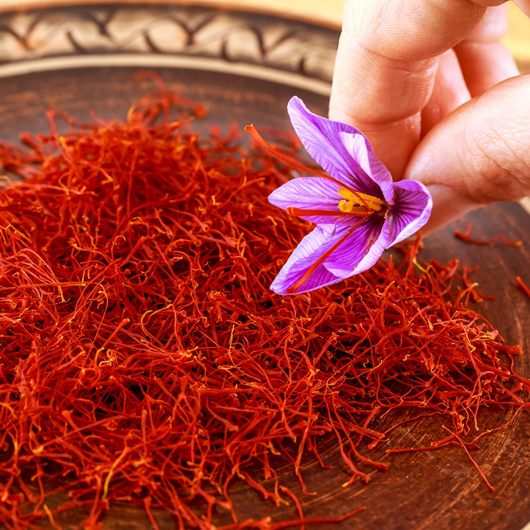 dried-saffron-with-flower-patterned-ceramic-plate-saffron-spice-used-food-traditional-herbal-medicine